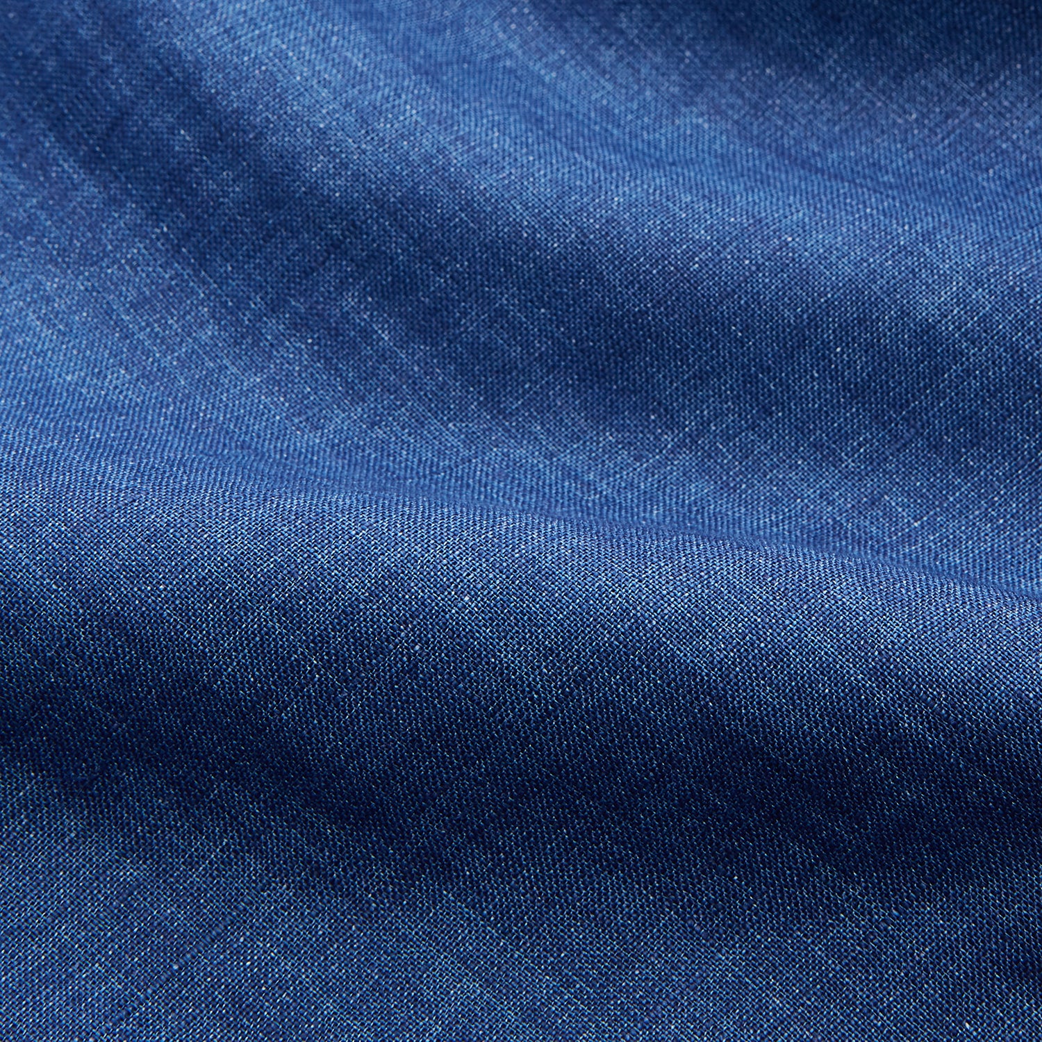 View 4 of product The Turnbull & Asser Navy Linen Weekend Fit Blake Shirt features long sleeves and a stand collar, shown here laid flat on a white background.