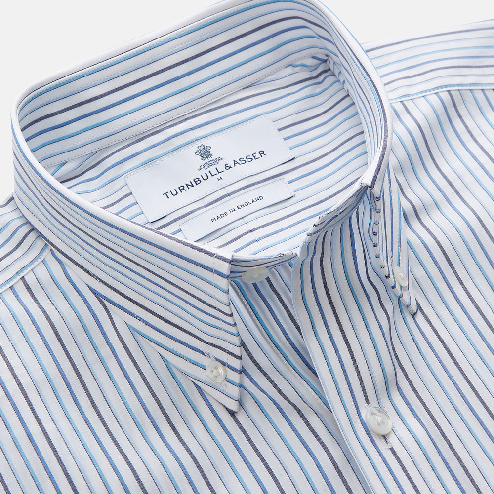 The Turnbull & Asser Blue Multi Blazer Stripe Weekend Fit Suffolk Shirt is a long-sleeved, collared button-up with vertical blue stripes and a chest pocket, shown laid flat on a white background—ideal for casual weekends.