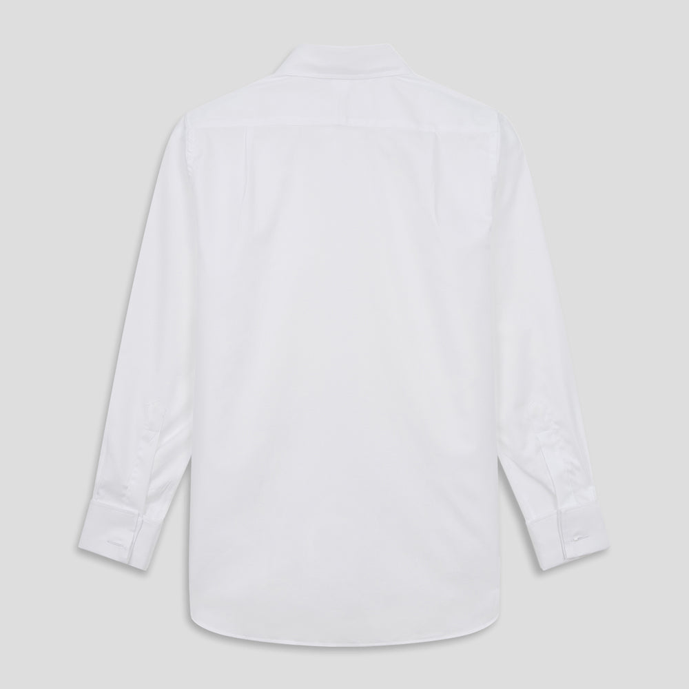 The Turnbull and The Deck White Cotton Traditionalist Shirt by Turnbull & Asser features a classic collar, buttoned front and cuffs, and a refined Royal Oxford weave, shown on a plain light gray background.