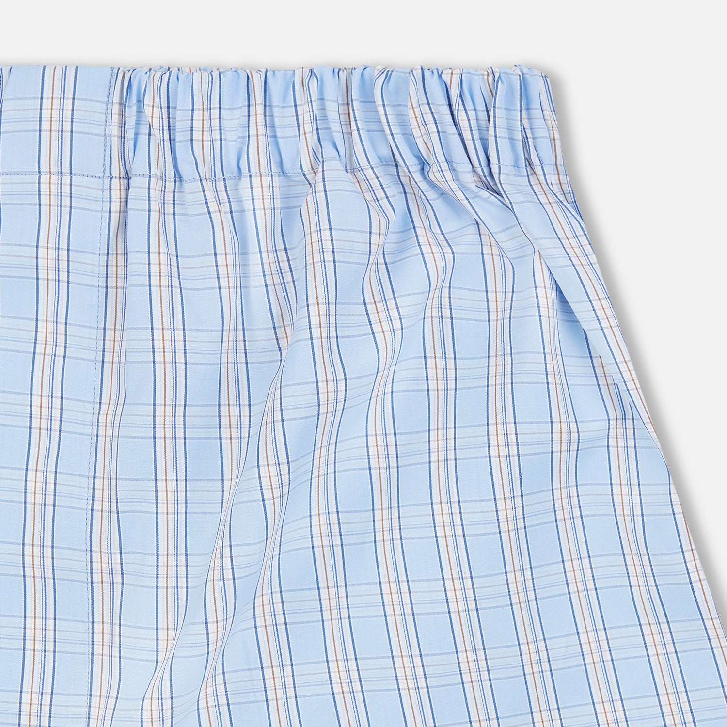 View 2 of product Turnbull & Asser Pale Blue Multi Check Cotton Godfrey Boxer Shorts with an elastic waistband, crafted from luxury cotton, displayed flat on a white background.