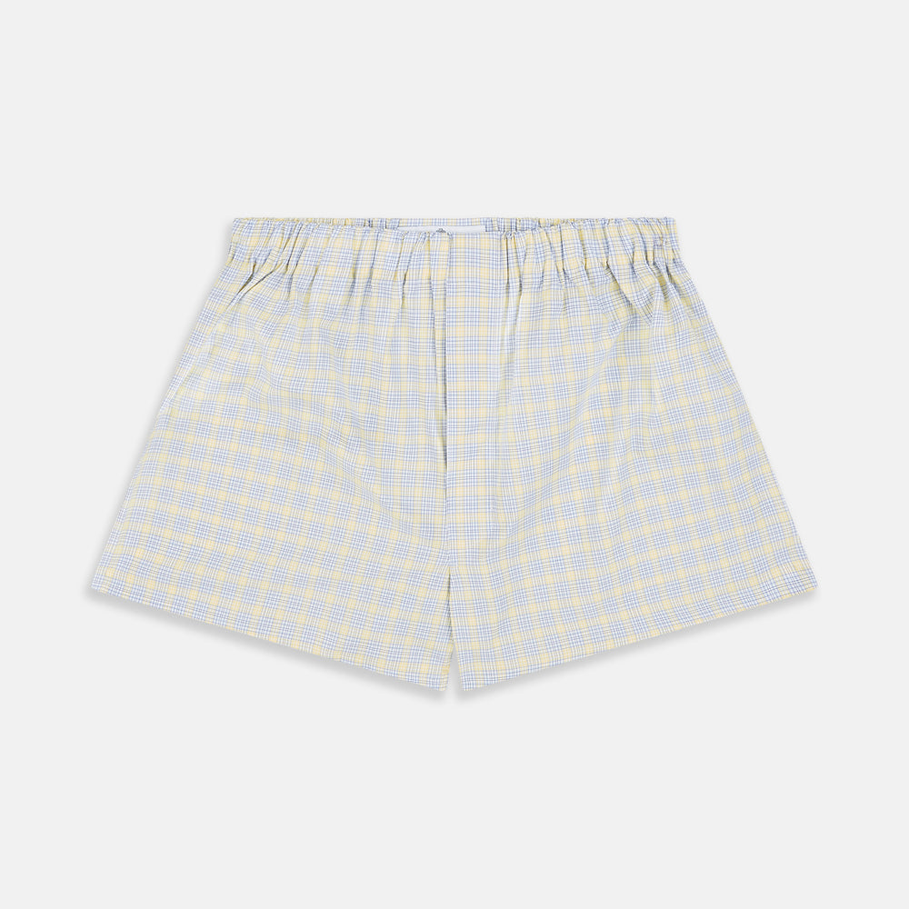 The Turnbull & Asser Yellow Multi Check Cotton Godfrey Boxer Shorts feature a light blue and yellow plaid, soft cotton fabric, and an elastic waistband, shown flat on a white background.