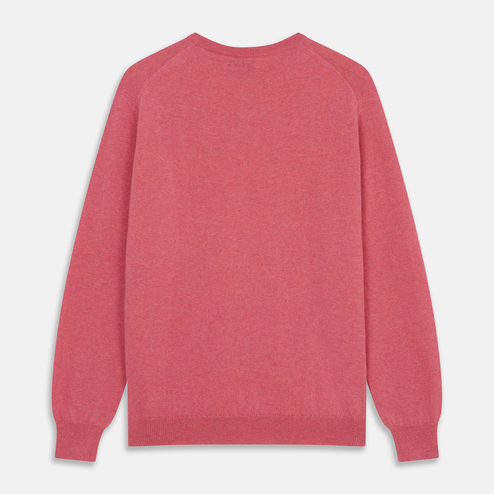 The Turnbull & Asser Pink Cashmere Glenn Jumper is a solid pink, long-sleeved menswear sweater with a crewneck, shown laid flat on a white background.