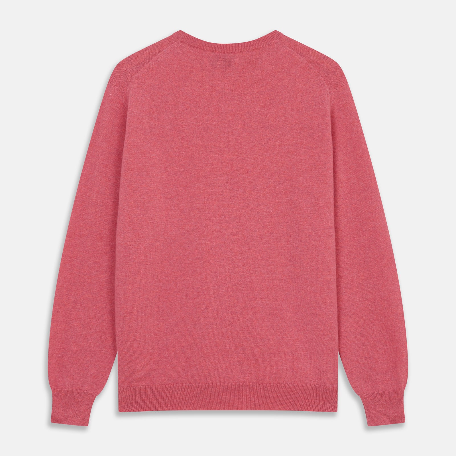 View 3 of product The Turnbull & Asser Pink Cashmere Glenn Jumper is a solid pink, long-sleeved menswear sweater with a crewneck, shown laid flat on a white background.