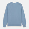 View 3 of product The Turnbull & Asser Pale Blue Cashmere Paden V-Neck Jumper features long sleeves, ribbed cuffs and hem, and is shown laid flat on a white background—an ideal choice for men's style.