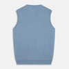 View 3 of product The Turnbull & Asser Pale Blue Cashmere Ifor Slipover is a sleeveless V-neck sweater vest with ribbed edges, shown laid flat on a white background—a classic menswear staple.
