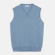 The Turnbull & Asser Pale Blue Cashmere Ifor Slipover is a sleeveless V-neck sweater vest with ribbed edges, shown laid flat on a white background—a classic menswear staple.