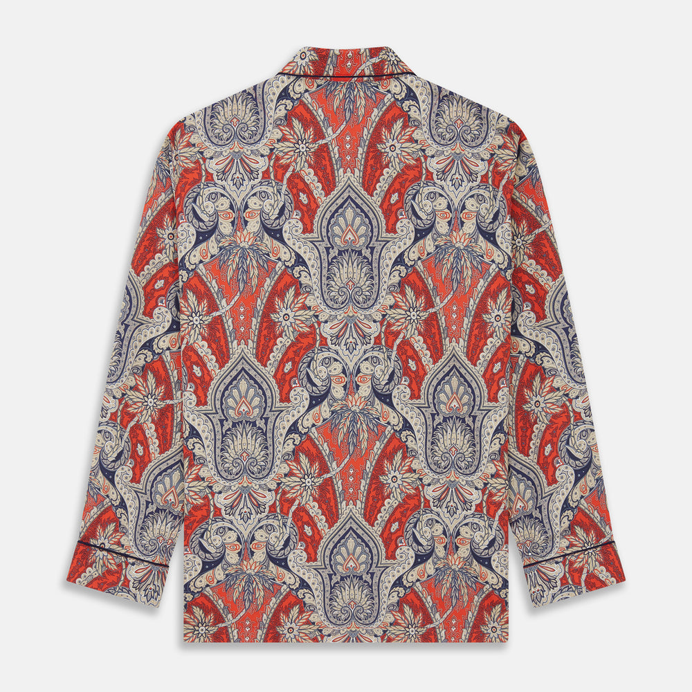 The Turnbull & Asser Red Baroque Silk-Blend Hyde Pyjama Set features a long-sleeve button-up shirt and matching pants in an intricate red, blue, and beige floral-geometric print, displayed flat against a white background.