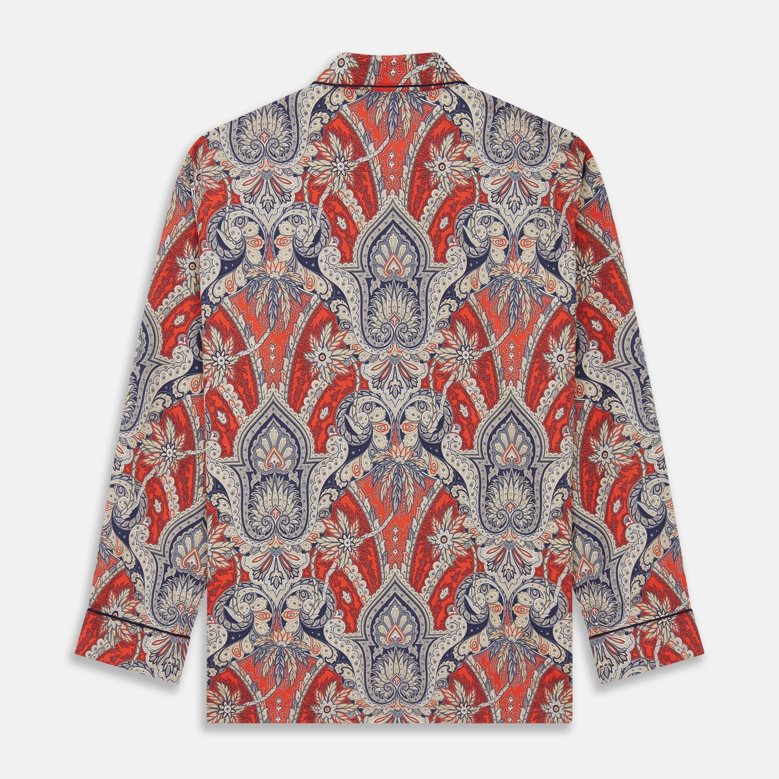 View 6 of product The Turnbull & Asser Red Baroque Silk-Blend Hyde Pyjama Set features a long-sleeve button-up shirt and matching pants in an intricate red, blue, and beige floral-geometric print, displayed flat against a white background.