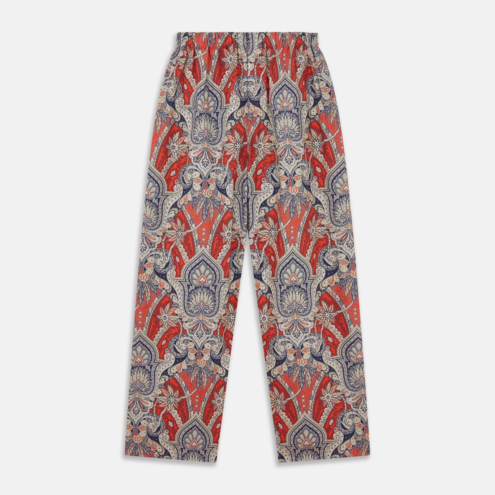 View 5 of product The Turnbull & Asser Red Baroque Silk-Blend Hyde Pyjama Set features a long-sleeve button-up shirt and matching pants in an intricate red, blue, and beige floral-geometric print, displayed flat against a white background.