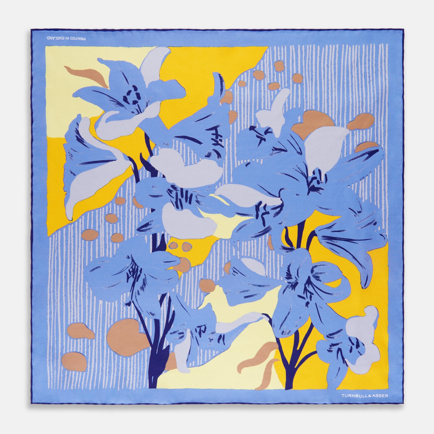 View 1 of product The Blue and Yellow Lily Silk Pocket Square by Turnbull & Asser features a vibrant, hand-drawn design of large blue lilies with dark stems on a yellow background adorned with pale blue stripes and tan abstract shapes.