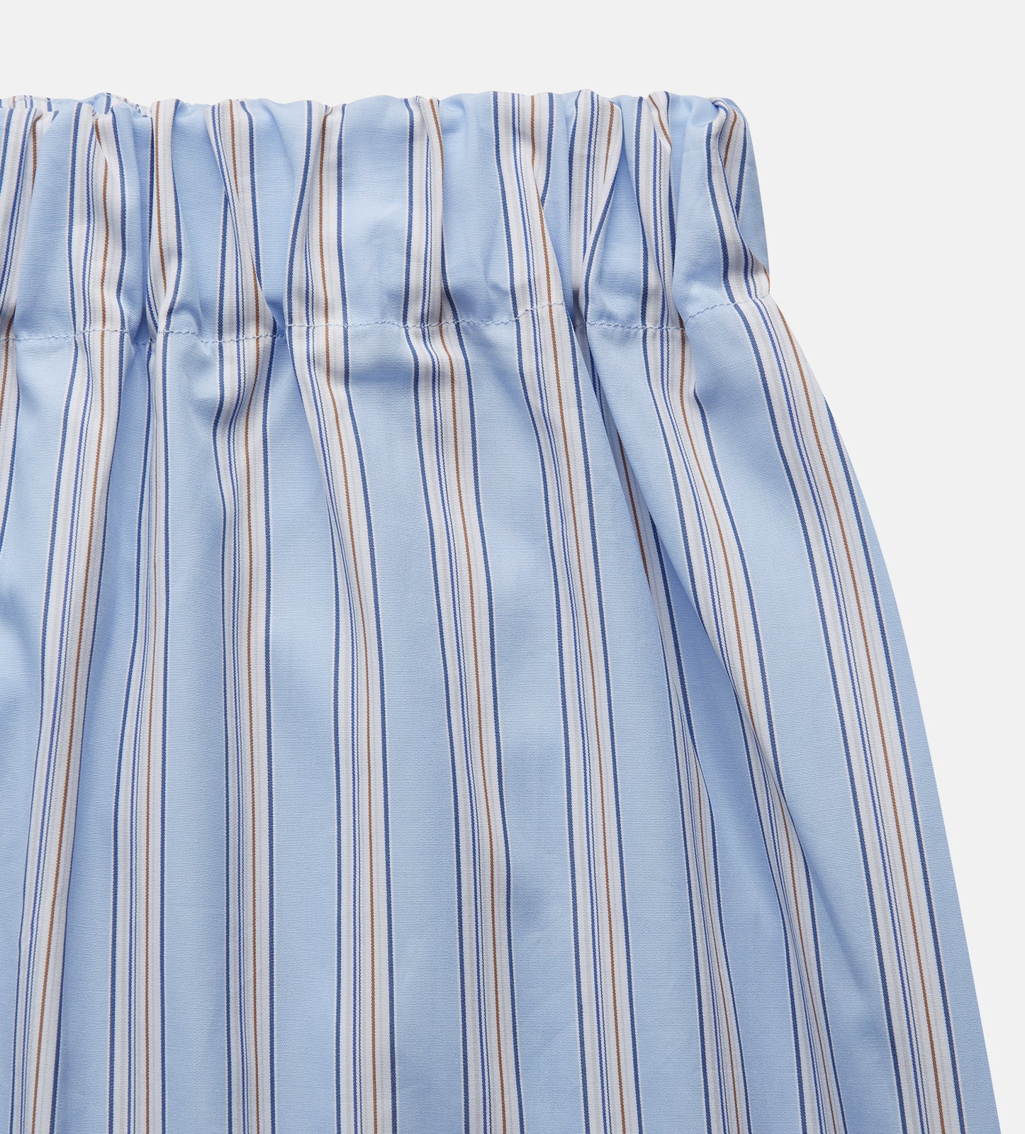 View 2 of product Turnbull & Asser Pale Blue Multi Stripe Cotton Hastings Pyjama Trousers with a modern fit, elastic waistband, and vertical white and yellow pinstripes, shown flat on a white background.