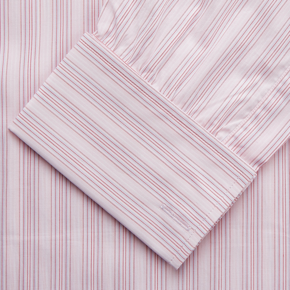 The Pink and Peach Multi Stripe Cotton Regular Fit Whitby Shirt by Turnbull & Asser features long sleeves, double cuffs, a button-down front, and a classic collar; shown laid flat on a white background.