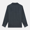 View 5 of product The Turnbull & Asser Grey Cotton and Linen Blend Holiday Fit Winnington Shirt features long sleeves, a spread collar, a left chest pocket, and white buttons, shown against a plain white background.