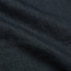 View 3 of product The Turnbull & Asser Grey Cotton and Linen Blend Holiday Fit Winnington Shirt features long sleeves, a spread collar, a left chest pocket, and white buttons, shown against a plain white background.