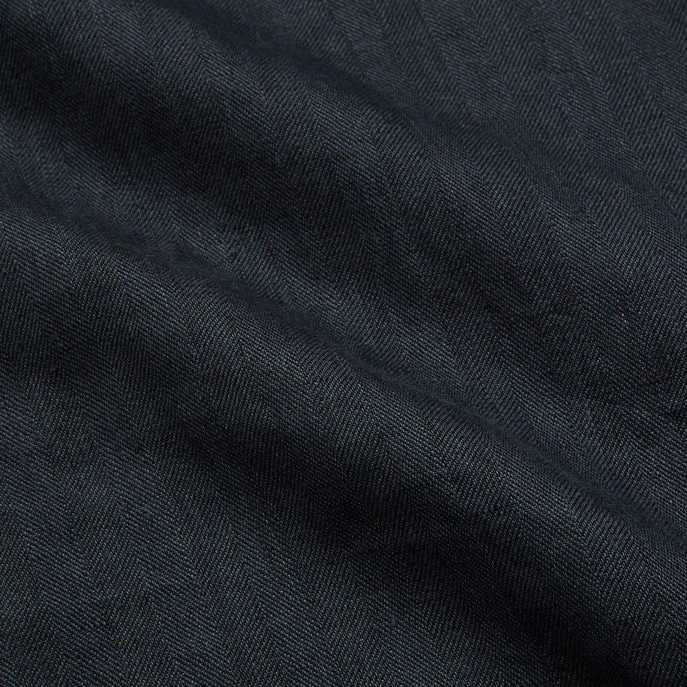 The Turnbull & Asser Grey Cotton and Linen Blend Holiday Fit Winnington Shirt features long sleeves, a spread collar, a left chest pocket, and white buttons, shown against a plain white background.