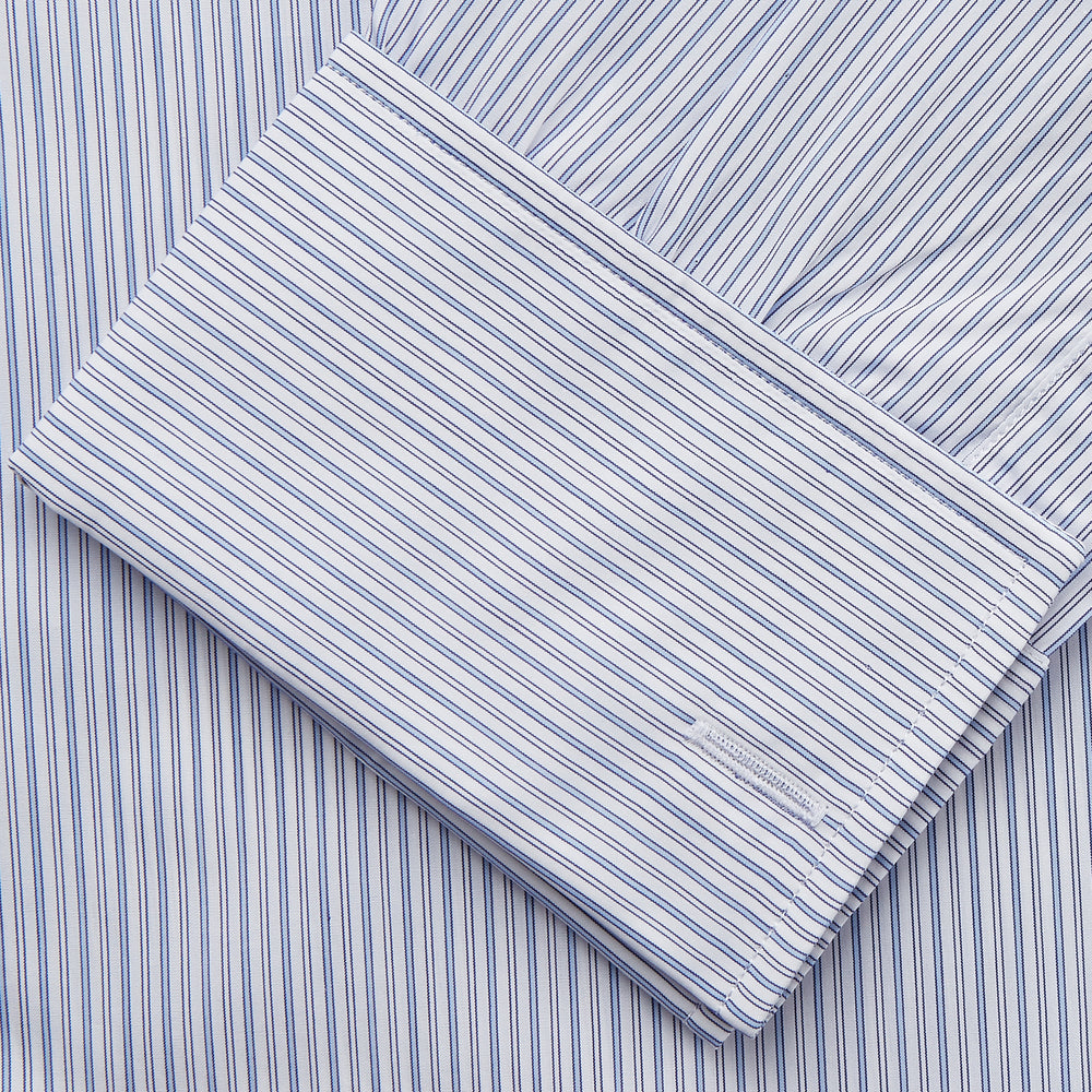 The Turnbull & Asser Blue Multi Stripe Cotton Regular Fit Whitby Shirt features long sleeves, a classic collar, button-down front, and double cuffs, shown laid flat on a white background.