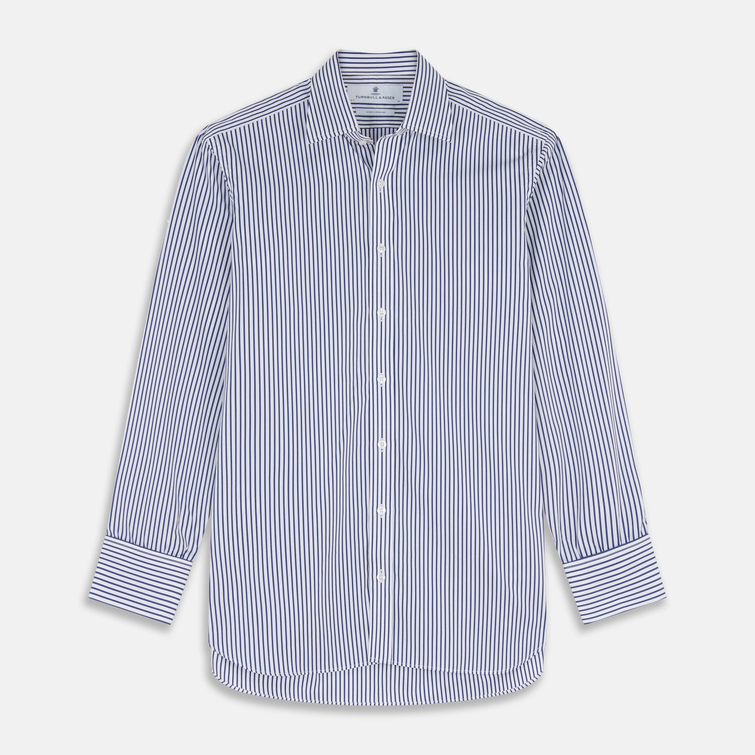 View 1 of product The Turnbull & Asser Navy Stripe Cotton Regular Fit Whitby Shirt features vertical blue and white stripes, long sleeves, a collar, double cuffs, and a button-down front, shown laid flat on a white background.