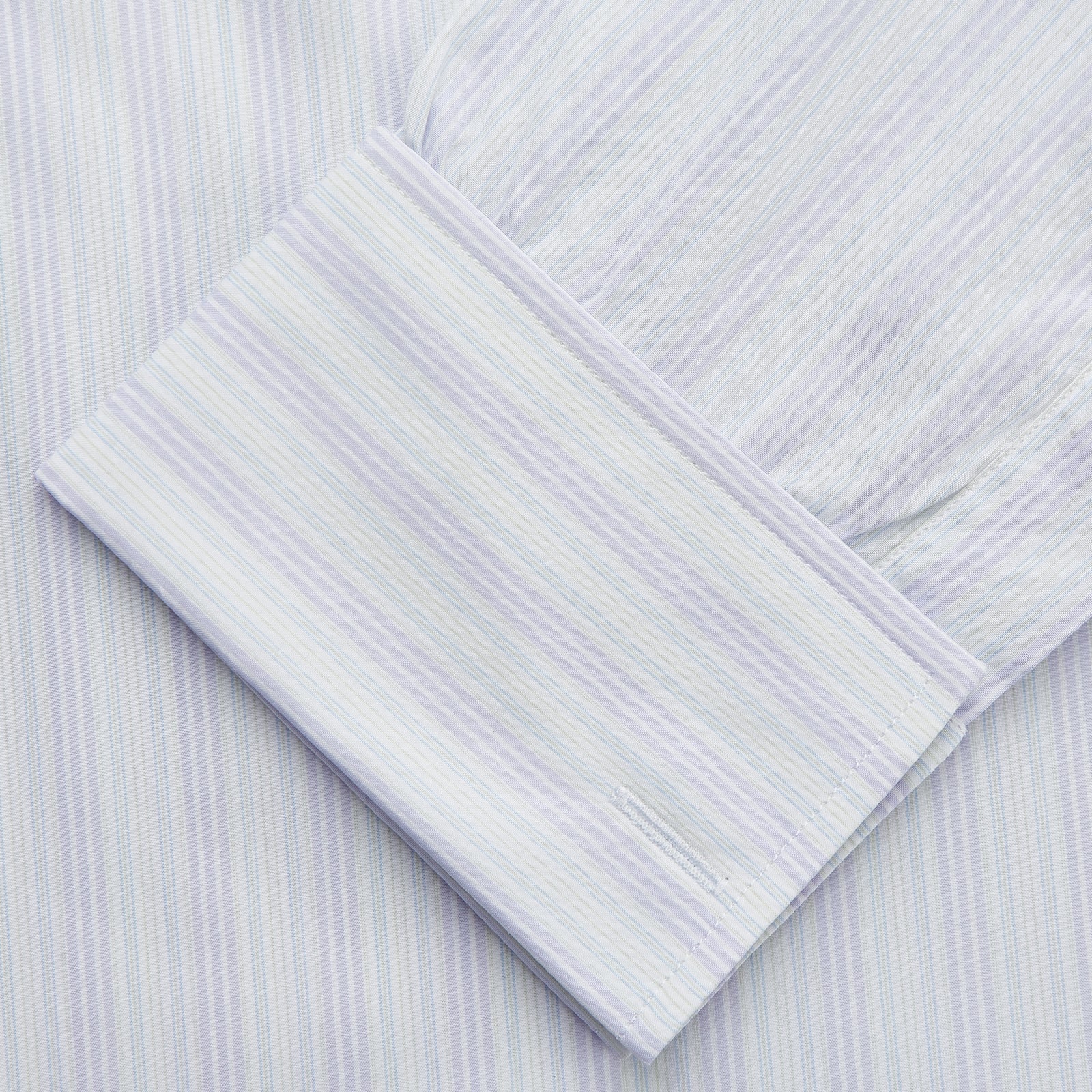 View 3 of product A Purple and Mint Multi Stripe Cotton Regular Fit Whitby Shirt by Turnbull & Asser with long sleeves, button-up front, pointed collar, and buttoned cuffs is laid flat on a white background.