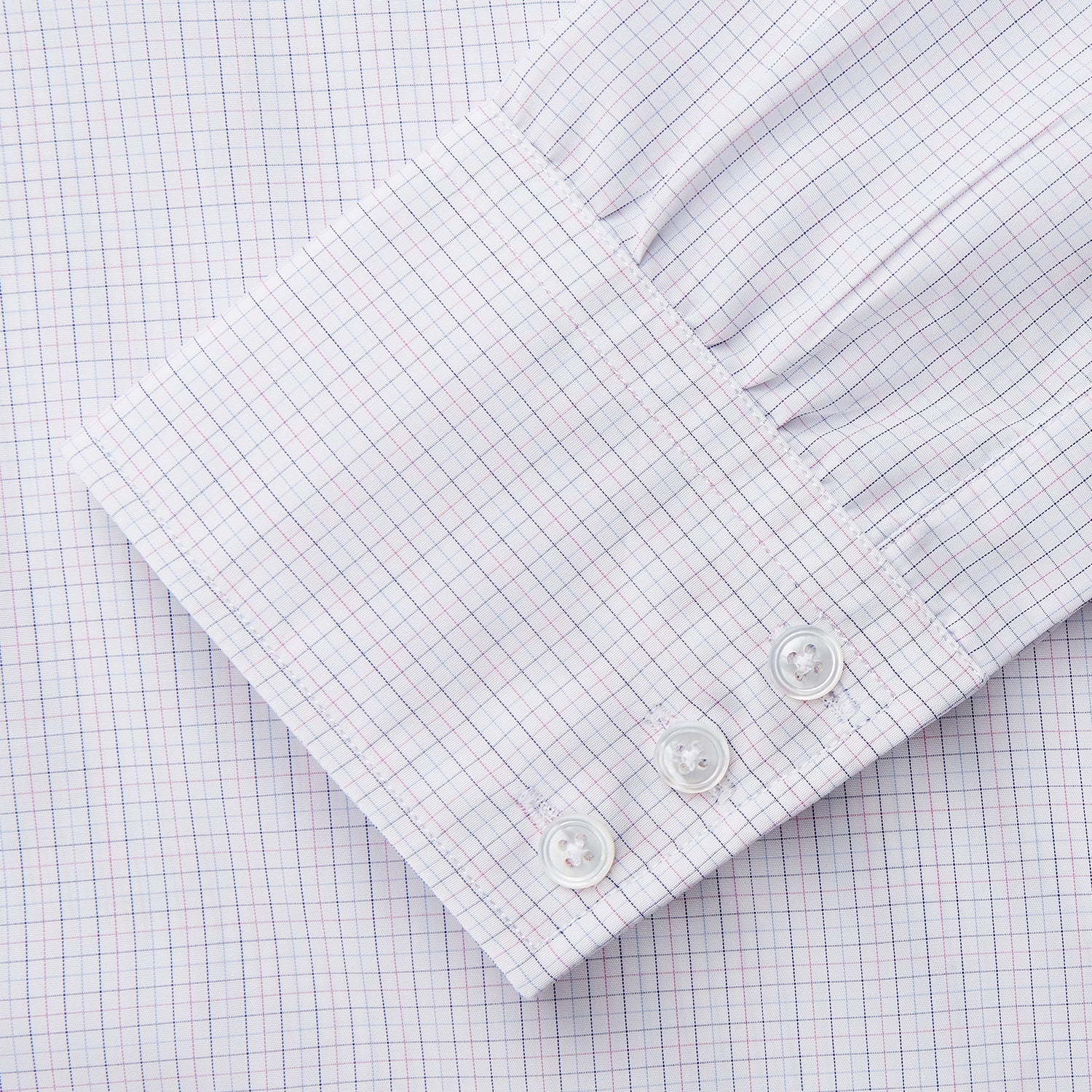 View 3 of product The Turnbull & Asser Blue Multi Check Cotton Regular Fit Mayfair Shirt features long sleeves, a button-down front, pointed collar, and buttoned cuffs, displayed on a plain white background.