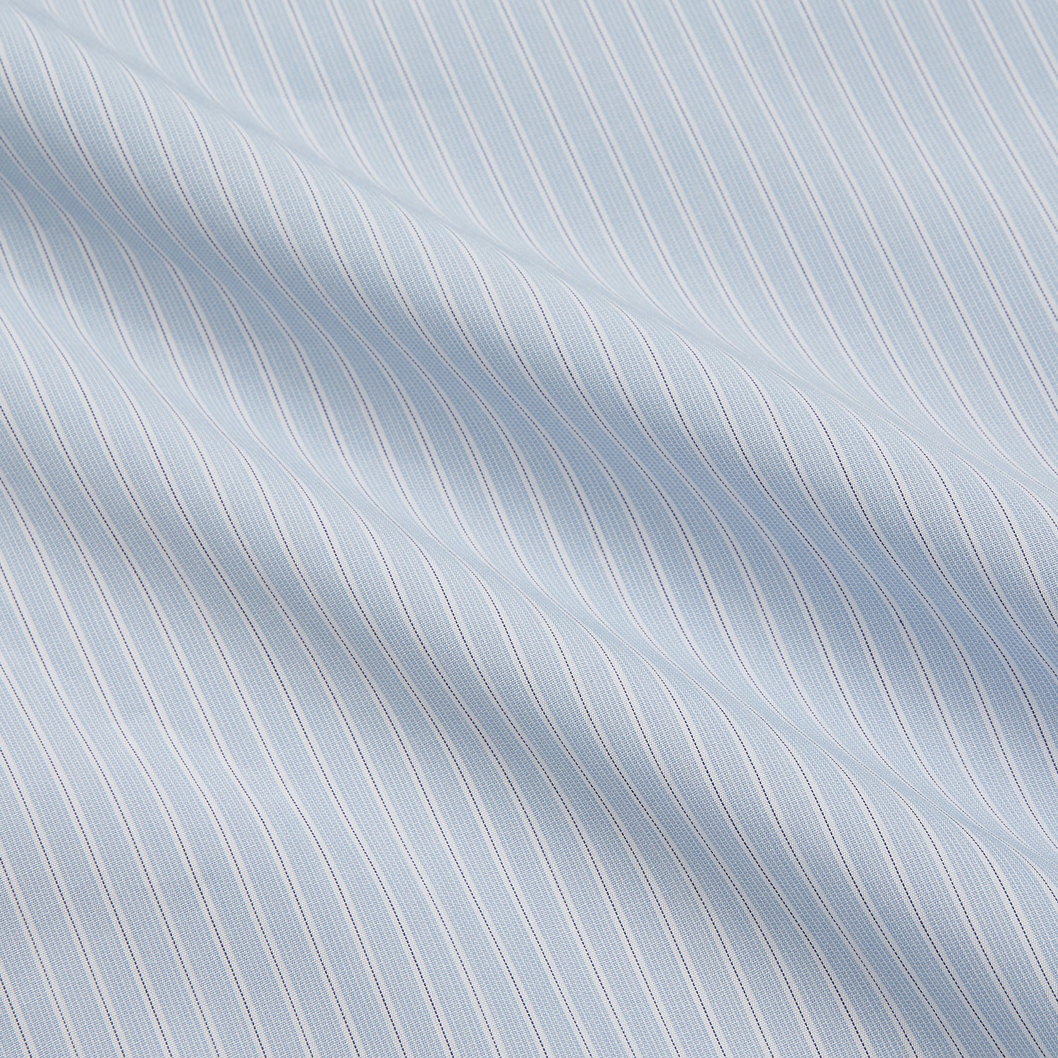 View 5 of product The Turnbull & Asser Pale Blue Stripe West Indian Sea Island Cotton Regular Fit Mayfair Shirt features long sleeves, a button-down front, and a classic collar—an essential for any men's wardrobe, shown on a plain white background.