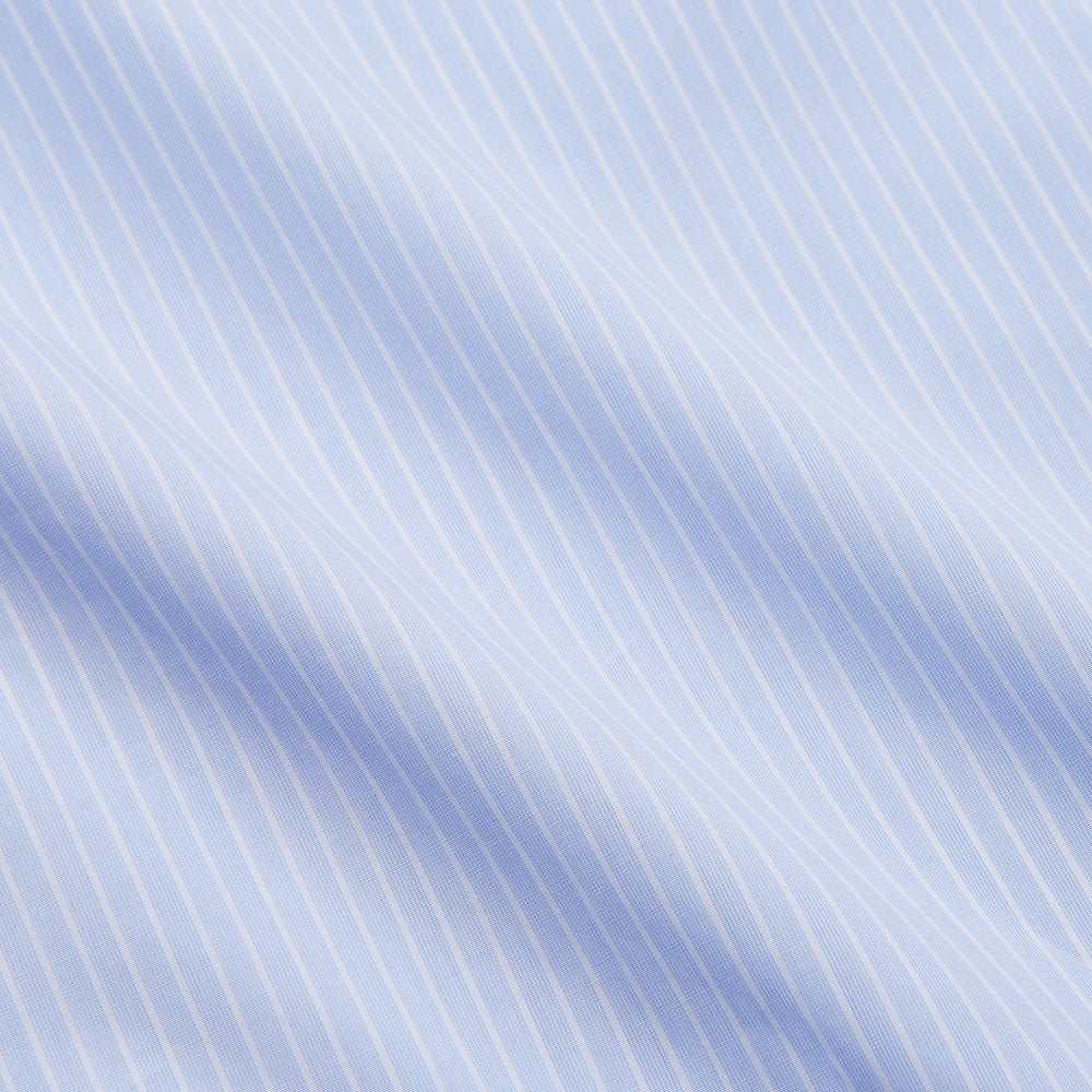 The Light Blue Multi-stripe Cotton Regular Fit Mayfair Shirt by Turnbull & Asser features a T&A collar, button-down front, and buttoned cuffs, displayed flat against a white background.