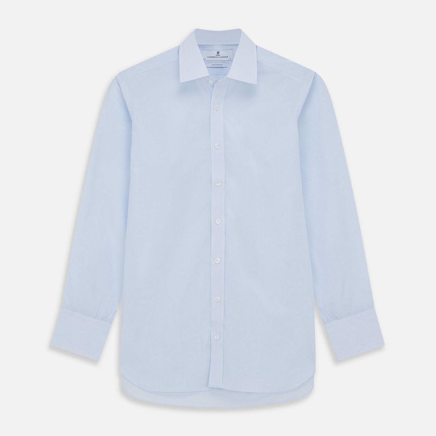 View 1 of product The Light Blue Multi-Check Cotton Regular Fit Mayfair Shirt by Turnbull & Asser is shown laid flat, featuring a classic T&A collar, front buttons, and buttoned cuffs on a white background.