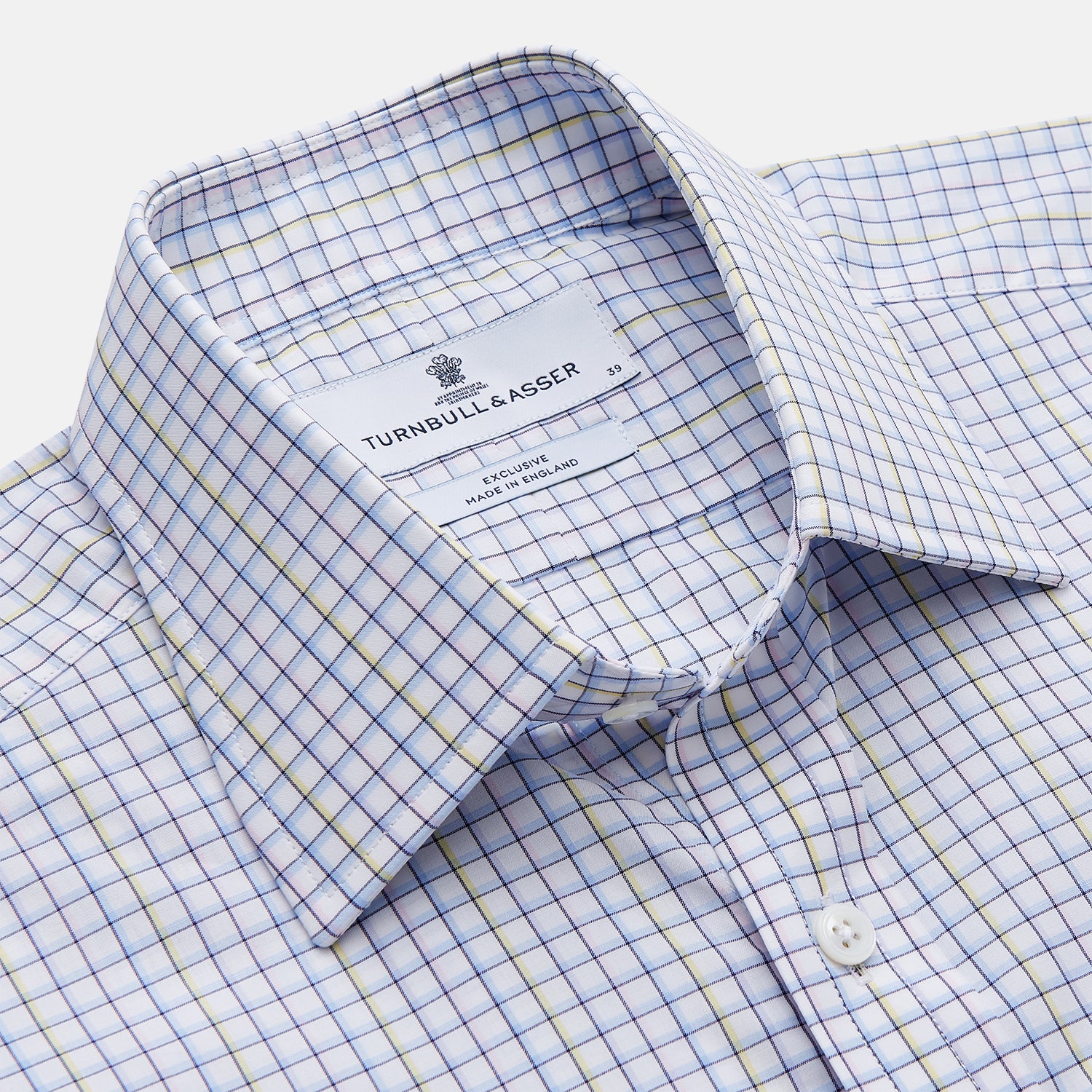 View 2 of product The Turnbull & Asser Purple Multi-check Cotton Mayfair Shirt is a men’s long-sleeve, button-up dress shirt with a T&A collar, featuring a purple multi-check pattern and shown flat on a white background.