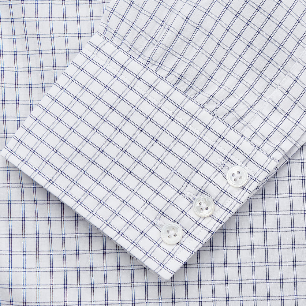 The Turnbull & Asser White and Blue Check Cotton Regular Fit Mayfair Shirt features a classic button-up design with long sleeves, traditional collar and cuffs, displayed flat against a white background.