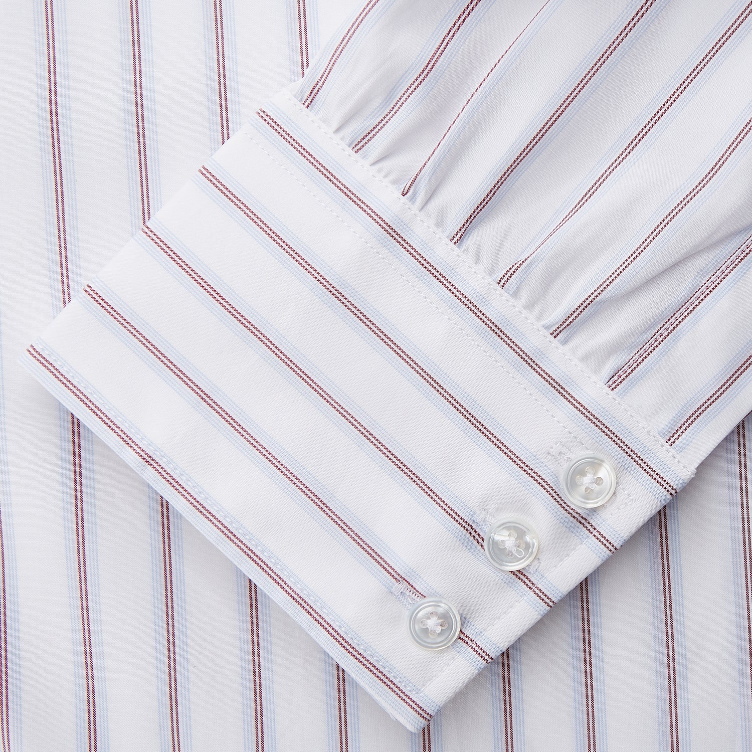 View 5 of product The Turnbull & Asser Red and Blue Multi-stripe Cotton Regular Fit Mayfair Shirt features a button-down front and classic collar, displayed on a plain white background.