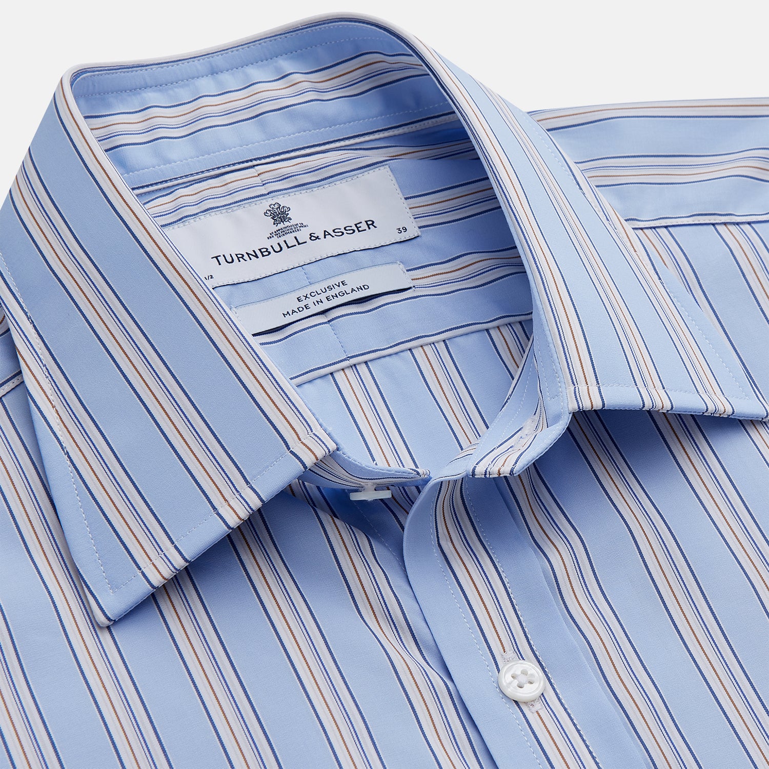 View 2 of product The Turnbull & Asser Pale Blue Multi-stripe Cotton Regular Fit Mayfair Shirt, featuring long sleeves, buttoned cuffs, and a signature T&A collar, is laid flat on a white background.