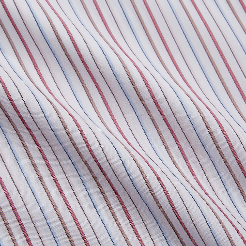 The Turnbull & Asser Red Multi-stripe Cotton Regular Fit Mayfair Shirt features red and blue vertical stripes on white, a T&A collar, and long sleeves. The shirt is shown neatly laid flat on a white surface.