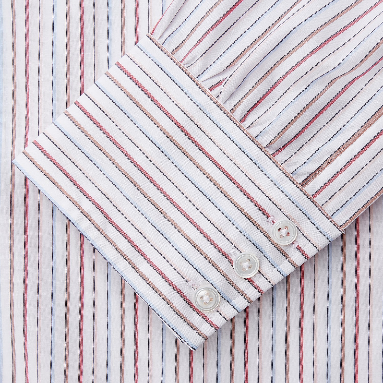 View 3 of product The Turnbull & Asser Red Multi-stripe Cotton Regular Fit Mayfair Shirt features red and blue vertical stripes on white, a T&A collar, and long sleeves. The shirt is shown neatly laid flat on a white surface.