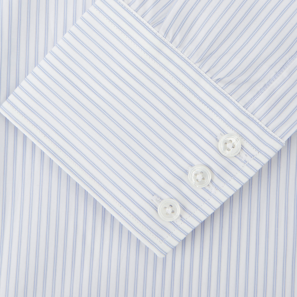 The Turnbull & Asser Pale Blue and White Multi-stripe Cotton Regular Fit Mayfair Shirt features a T&A collar and buttoned cuffs, shown on a plain white background.