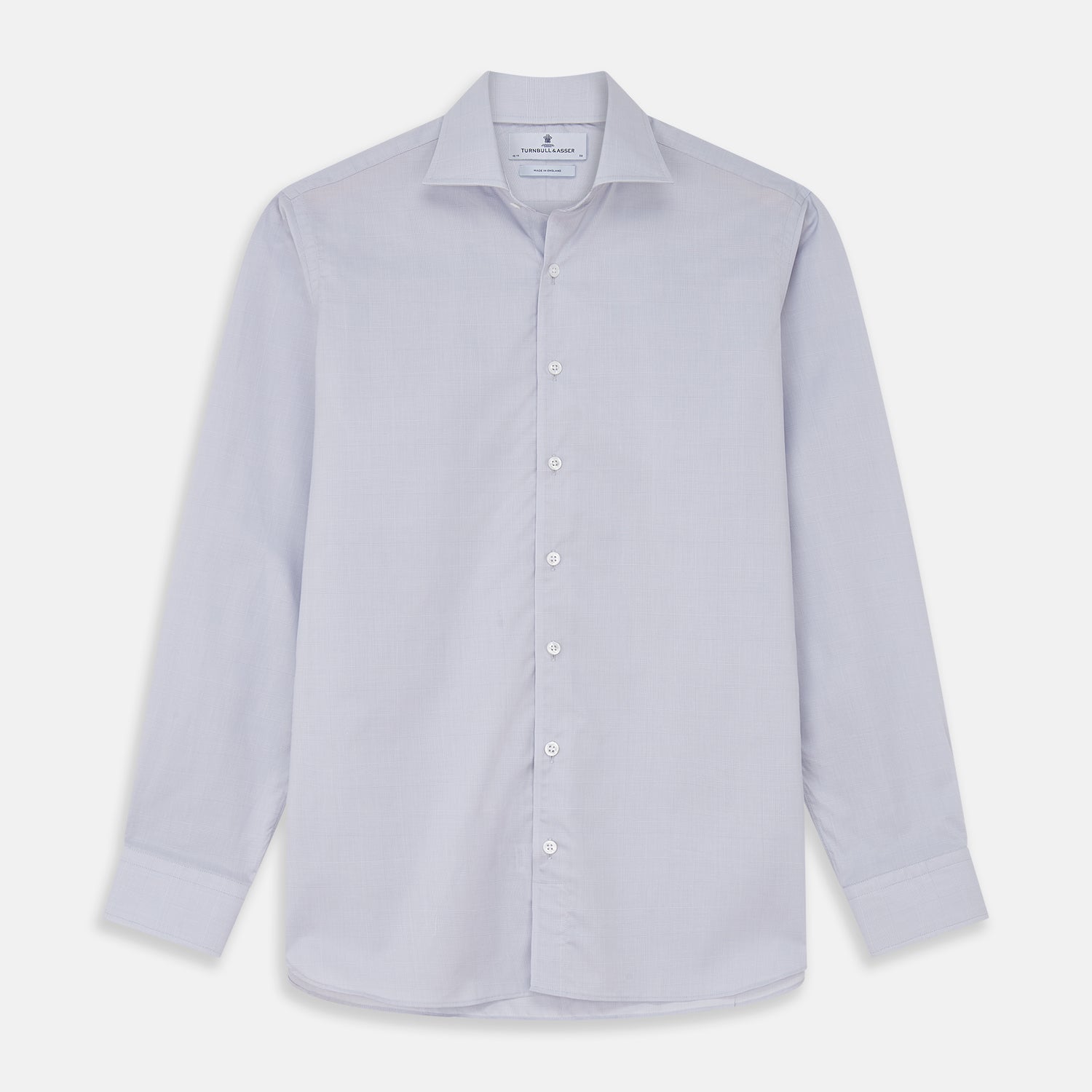 View 1 of product The Turnbull & Asser Faded Blue Block Check Cotton Shelton Shirt features a tailored fit, long sleeves, button-down front, and classic collar, displayed flat on a white background.