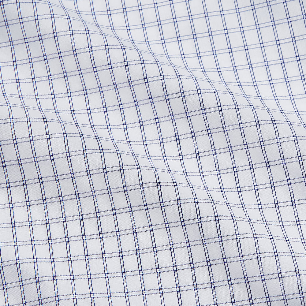 The Turnbull & Asser White and Blue Check Cotton Tailored Fit Shelton Shirt, a men's button-up dress shirt, is shown laid flat on a white background.