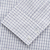 View 3 of product The Turnbull & Asser White and Blue Check Cotton Tailored Fit Shelton Shirt, a men's button-up dress shirt, is shown laid flat on a white background.