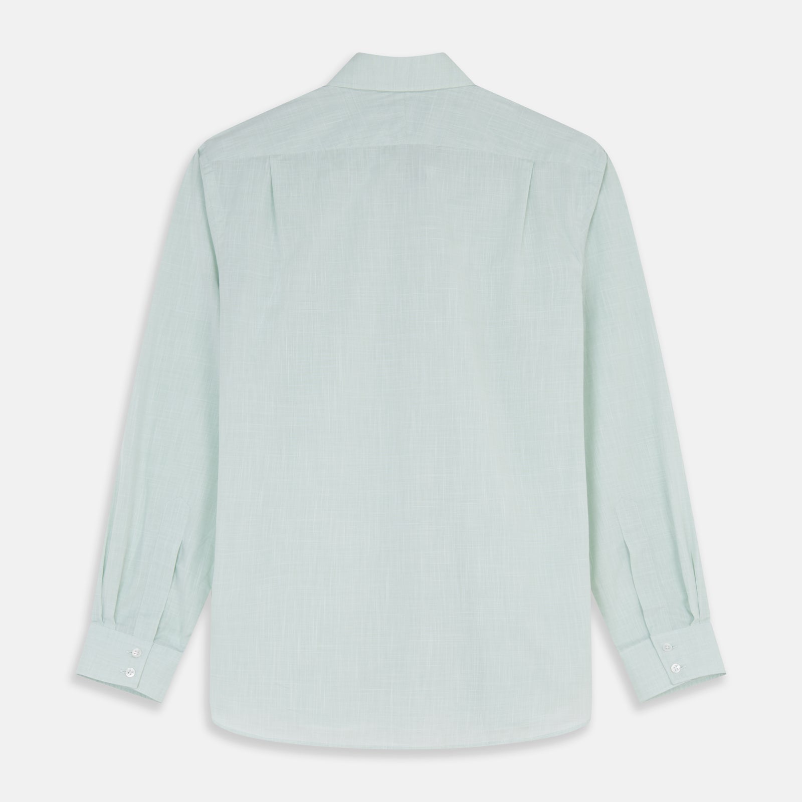 View 5 of product The Turnbull & Asser Light Green Chambray Tailored Fit Shelton Shirt features long sleeves, a classic collar, and white buttons—an elegant men's formal shirt shown neatly laid flat on a white background.