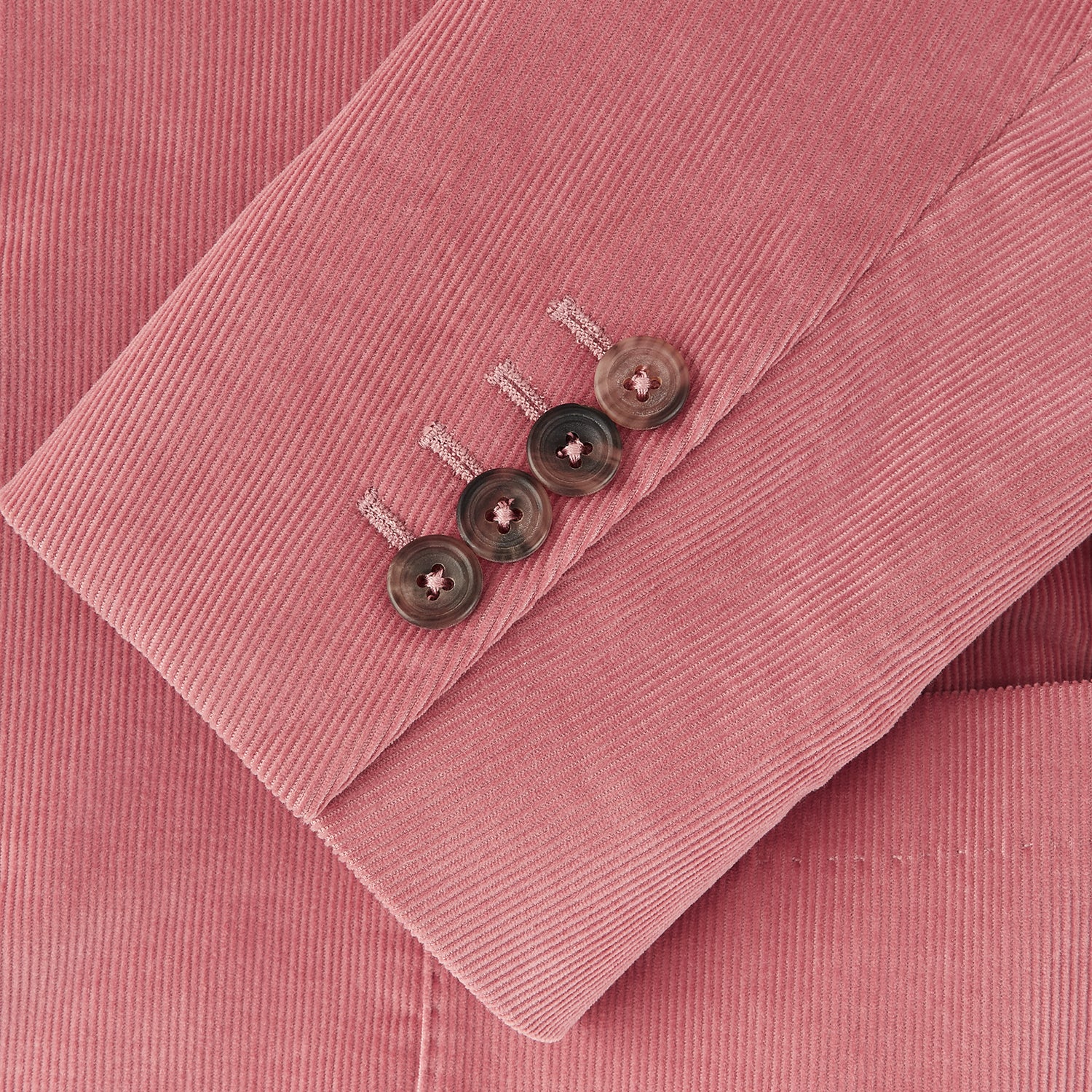 View 2 of product The Turnbull & Asser Pink Cord Bern Blazer features notch lapels, two brown buttons, three front pockets, and buttoned cuffs, showcasing Italian tailoring against a plain white background.