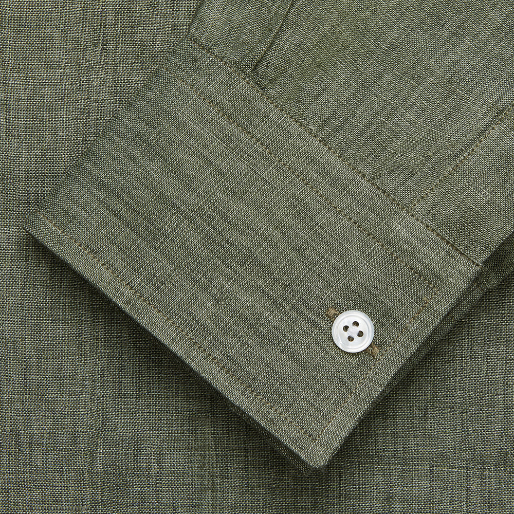 The Sage Green Linen Weekend Fit Finch Shirt by Turnbull & Asser features a classic collar, white buttons, and a single chest pocket—an essential piece for any men's wardrobe. Displayed flat on a white background for a clean look.