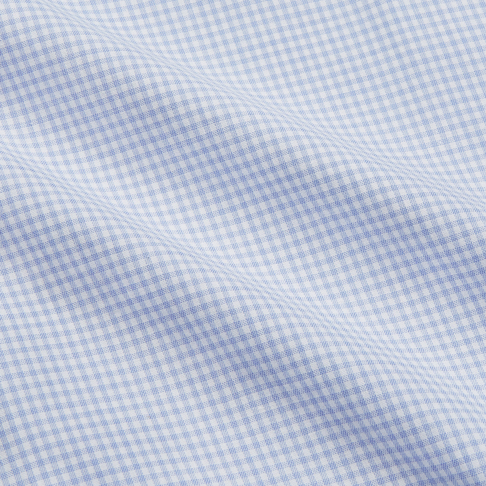 The Turnbull & Asser Pale Blue Multi Check Cashmerello Weekend Fit Hayne Shirt features a Dorset button-down collar, long sleeves, and front buttons. Shown laid flat on a white background.