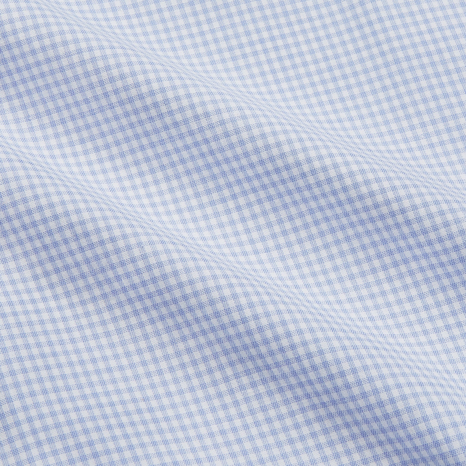 View 4 of product The Turnbull & Asser Pale Blue Multi Check Cashmerello Weekend Fit Hayne Shirt features a Dorset button-down collar, long sleeves, and front buttons. Shown laid flat on a white background.