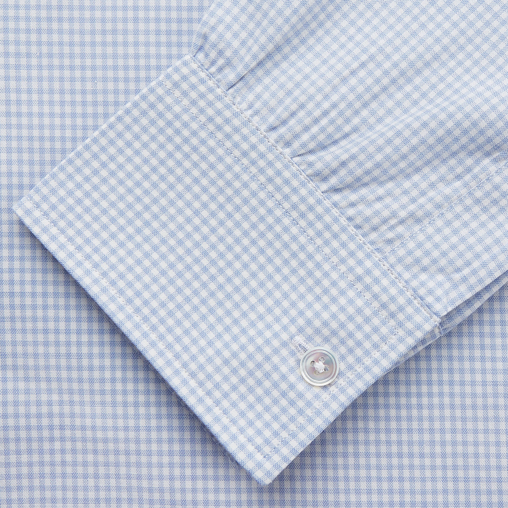 The Turnbull & Asser Pale Blue Multi Check Cashmerello Weekend Fit Hayne Shirt features a Dorset button-down collar, long sleeves, and front buttons. Shown laid flat on a white background.