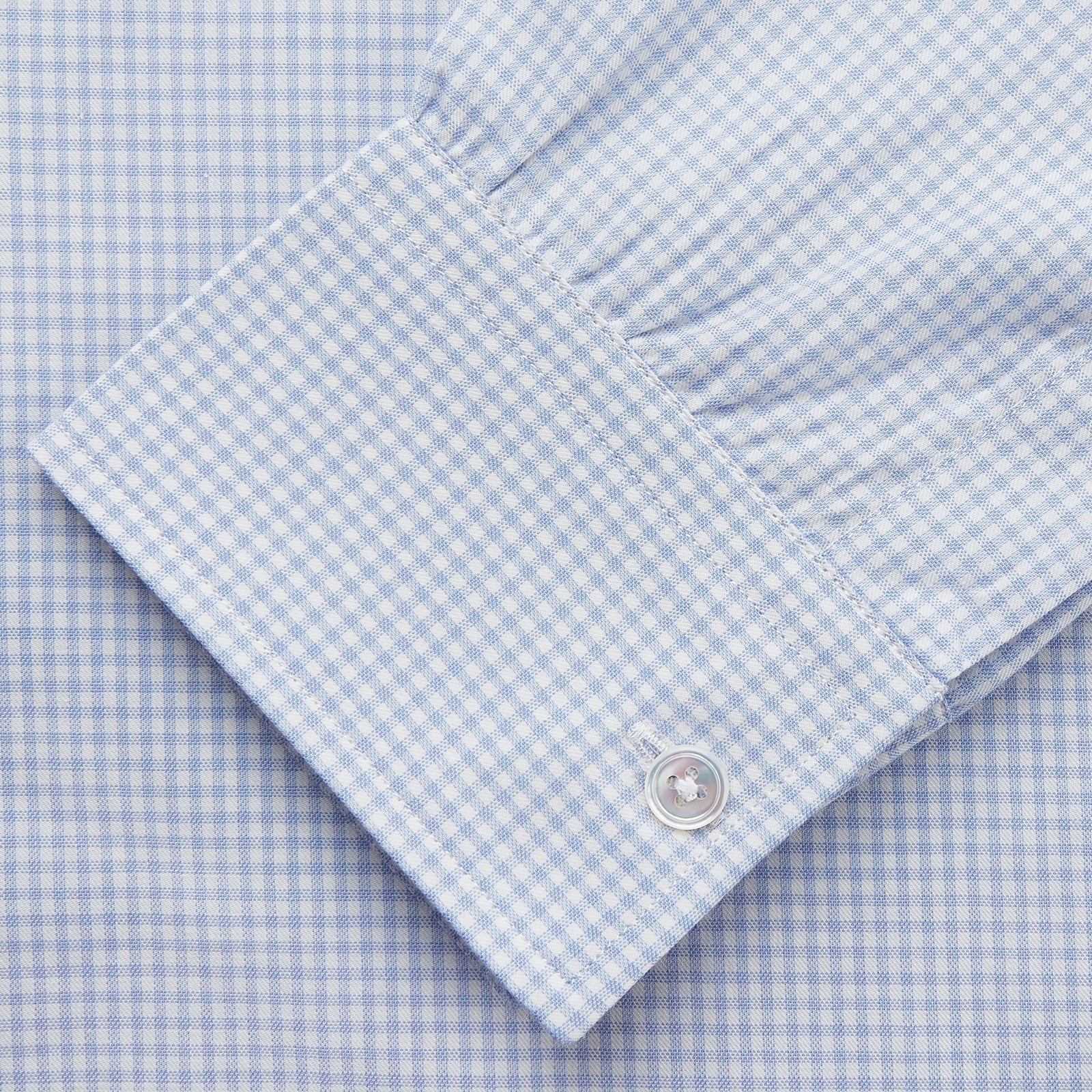 View 3 of product The Turnbull & Asser Pale Blue Multi Check Cashmerello Weekend Fit Hayne Shirt features a Dorset button-down collar, long sleeves, and front buttons. Shown laid flat on a white background.