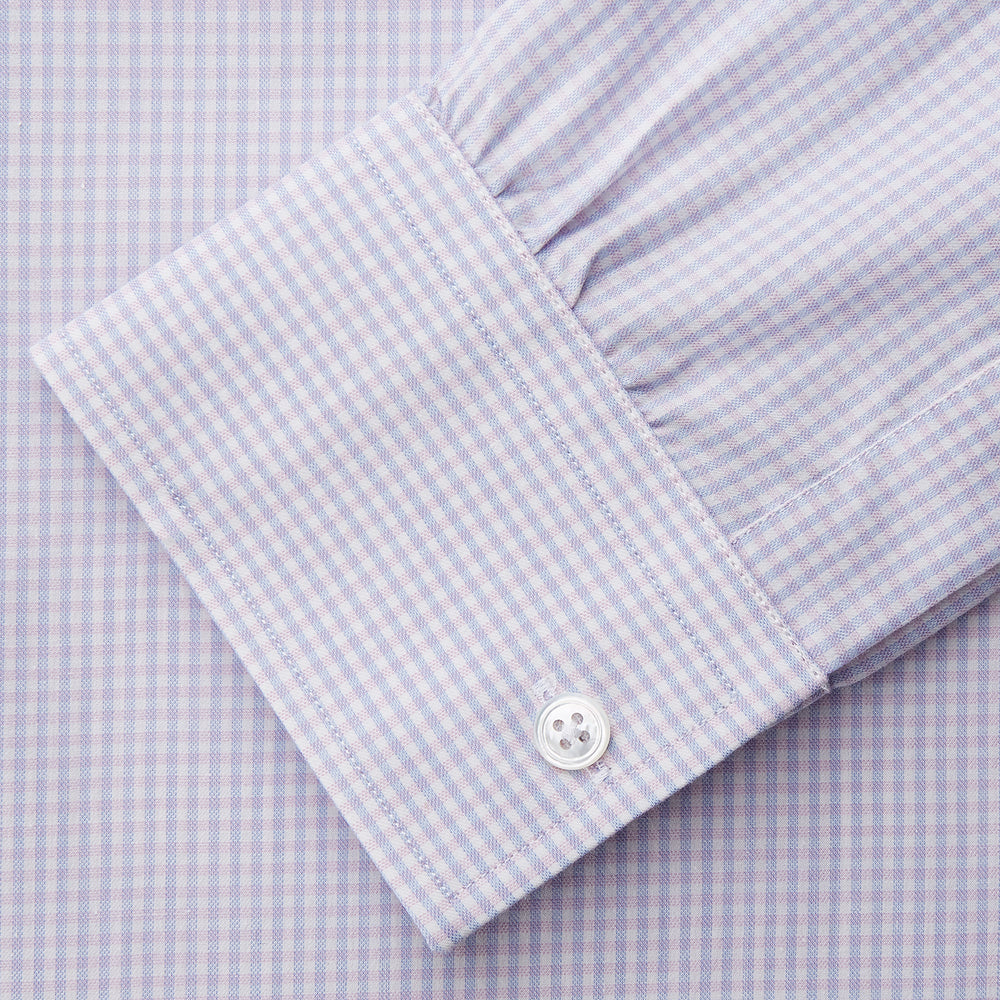 The Blue Multi Check Cashmerello Weekend Fit Hayne Shirt by Turnbull & Asser features long sleeves, a button-down front, Dorset collar, buttoned cuffs, and a blue check pattern, shown laid flat on a white background.