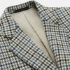 View 2 of product The Grey and Navy Tweed Barrington Blazer by Turnbull & Asser is a single-breasted jacket with notched lapels, two front buttons, flap pockets, and a tailored fit—expertly made in Italy for sophisticated style.