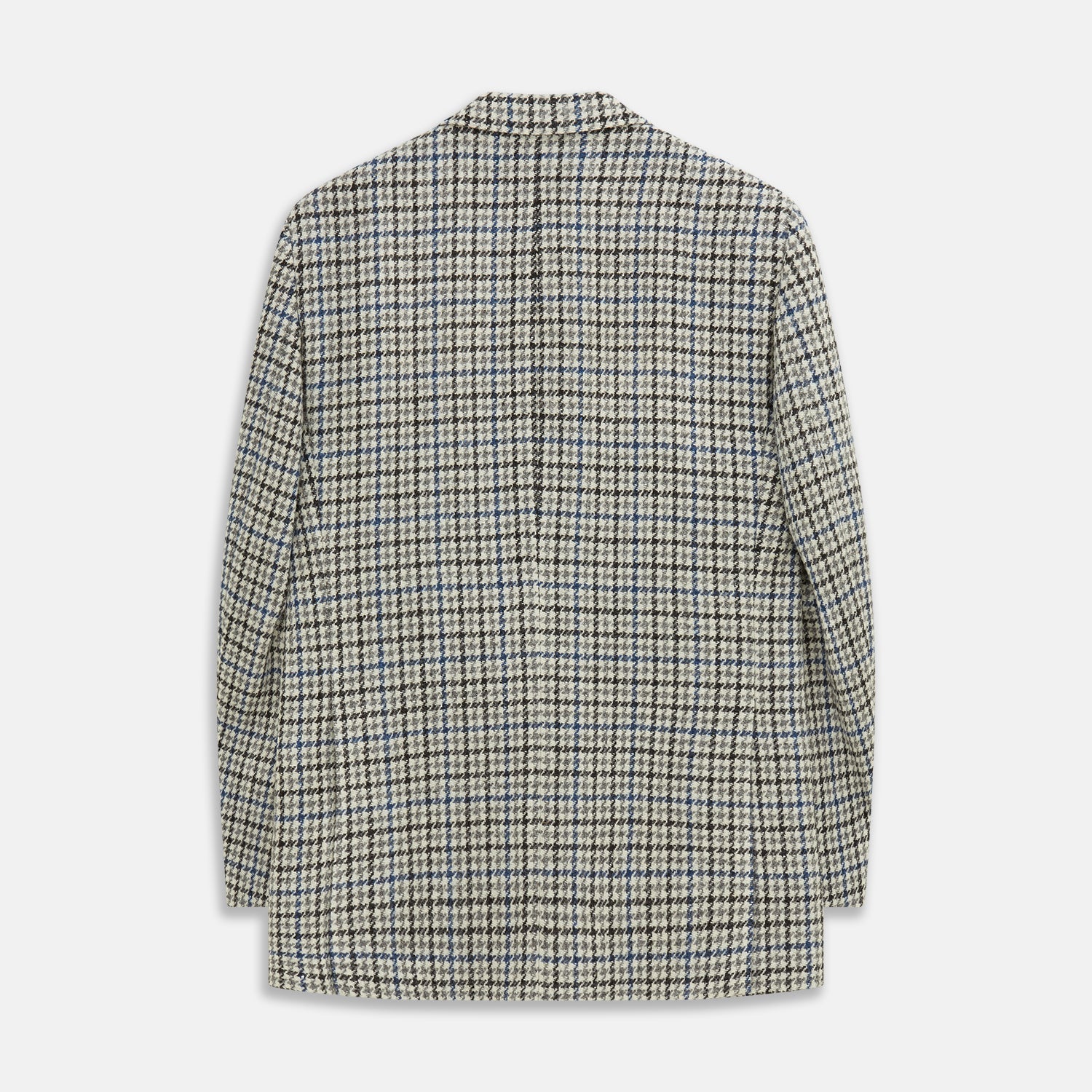 View 4 of product The Grey and Navy Tweed Barrington Blazer by Turnbull & Asser is a single-breasted jacket with notched lapels, two front buttons, flap pockets, and a tailored fit—expertly made in Italy for sophisticated style.