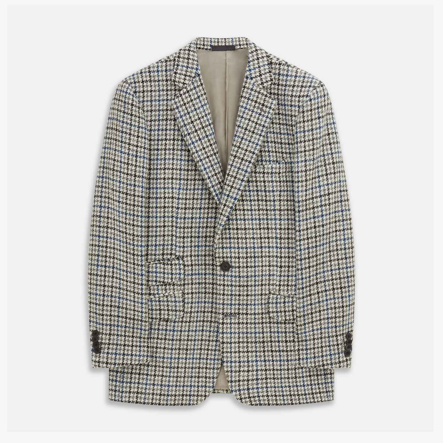 View 1 of product The Grey and Navy Tweed Barrington Blazer by Turnbull & Asser is a single-breasted jacket with notched lapels, two front buttons, flap pockets, and a tailored fit—expertly made in Italy for sophisticated style.