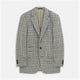 The Grey and Navy Tweed Barrington Blazer by Turnbull & Asser is a single-breasted jacket with notched lapels, two front buttons, flap pockets, and a tailored fit—expertly made in Italy for sophisticated style.