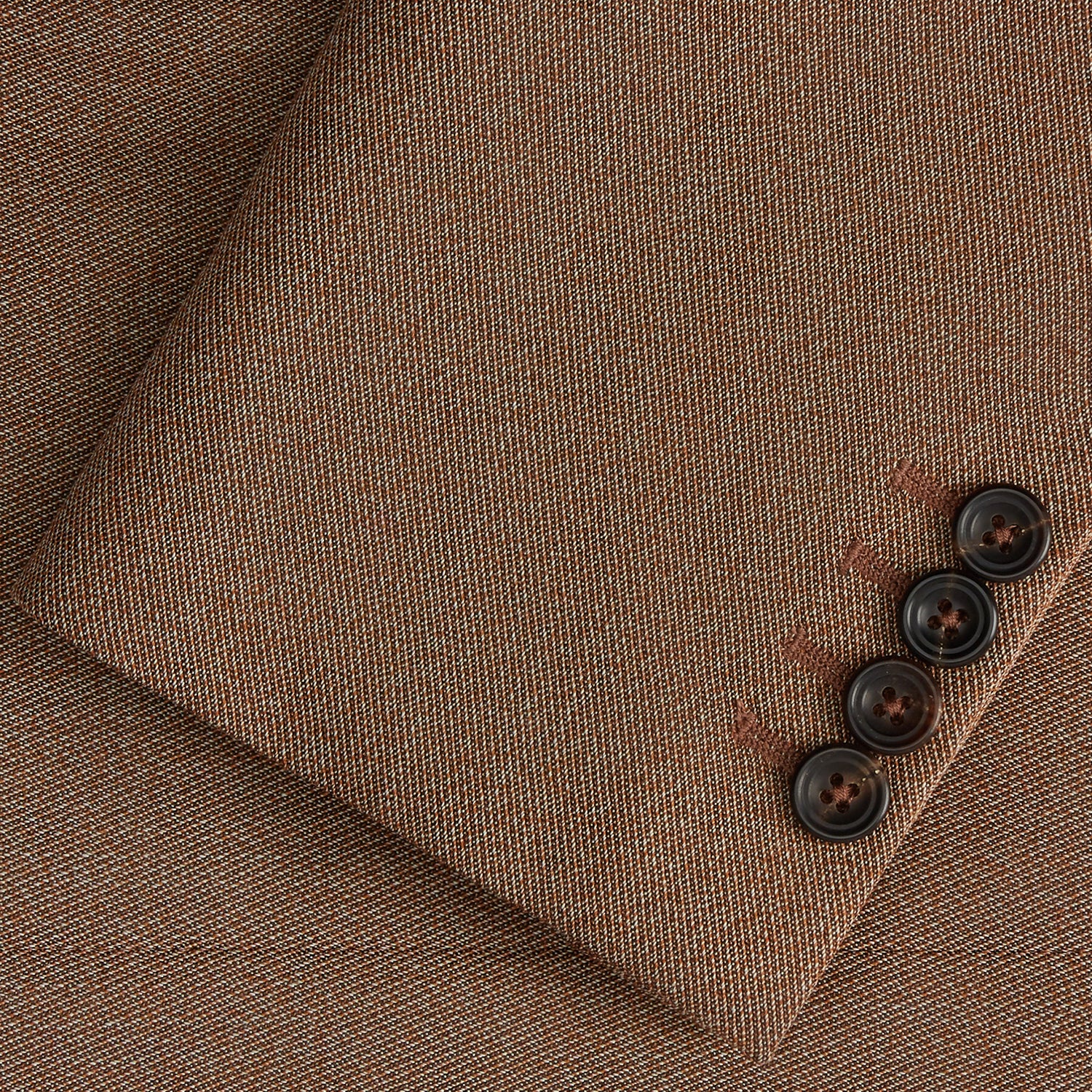 View 2 of product The Brown Virgin Wool Bern Blazer by Turnbull & Asser features notch lapels, two front patch pockets, a chest pocket, buttoned cuffs, and two buttons, shown over a beige collared shirt against a white background.