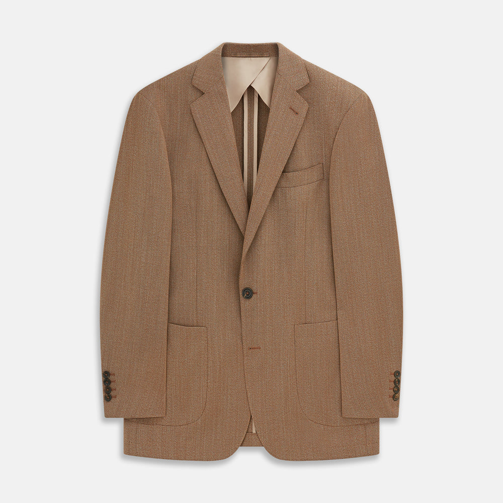 The Brown Virgin Wool Bern Blazer by Turnbull & Asser features notch lapels, two front patch pockets, a chest pocket, buttoned cuffs, and two buttons, shown over a beige collared shirt against a white background.